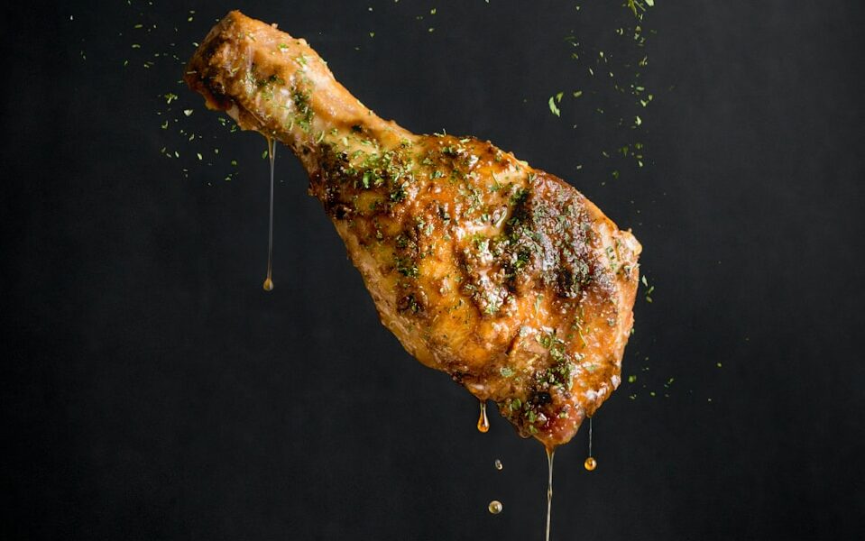 a piece of meat with sprinkles on it